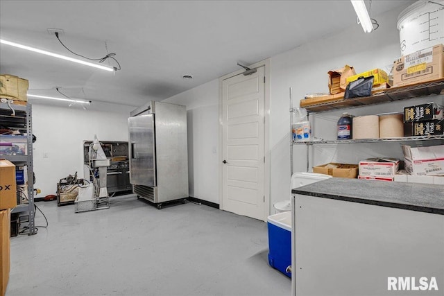 701 E Pearl St, Tremont, IL 61568 - below grade area with freestanding refrigerator