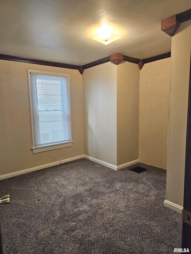 723 E Maywood Ave, Peoria, IL 61603 - spare room featuring ornamental molding, carpet floors, and baseboards