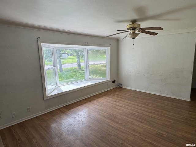 4405 Silvis Rd, Bartonville, IL 61607 - unfurnished room featuring wood finished floors, ceiling fan, ornamental molding, and baseboards