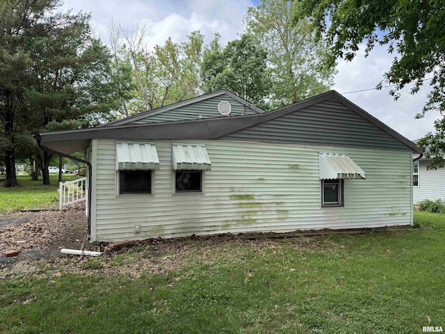 4405 Silvis Rd, Bartonville, IL 61607 - view of home's exterior featuring a lawn