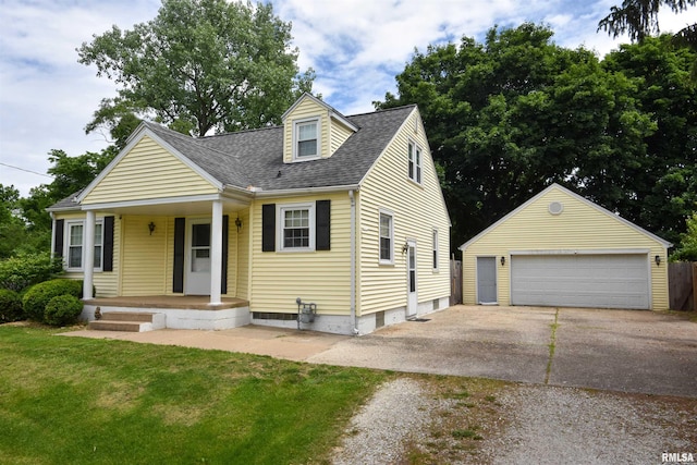 306 William St, East Peoria, IL 61611 - new england style home with a detached garage, an outdoor structure, covered porch, a front yard, and a shingled roof