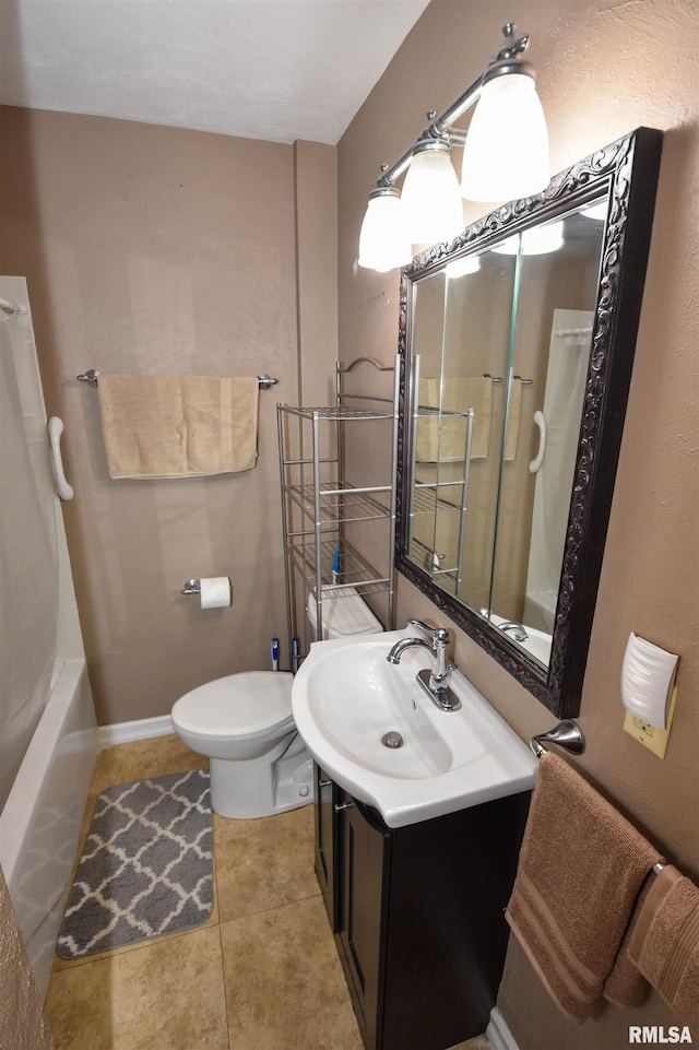 306 William St, East Peoria, IL 61611 - bathroom featuring vanity, toilet, and tile patterned floors