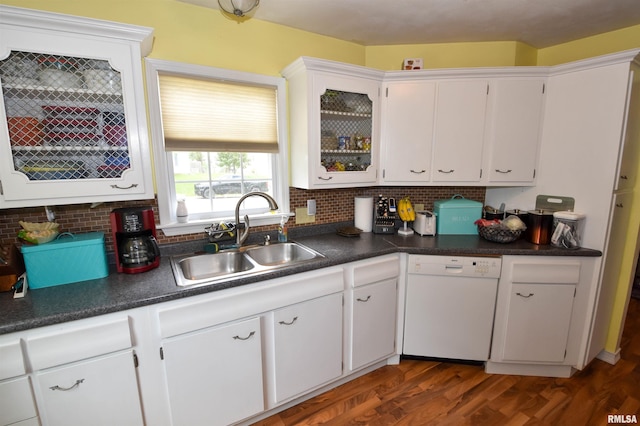 306 William St, East Peoria, IL 61611 - kitchen featuring dishwasher, a sink, white cabinets, and tasteful backsplash