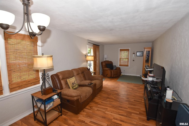 306 William St, East Peoria, IL 61611 - living area featuring wood finished floors and baseboards