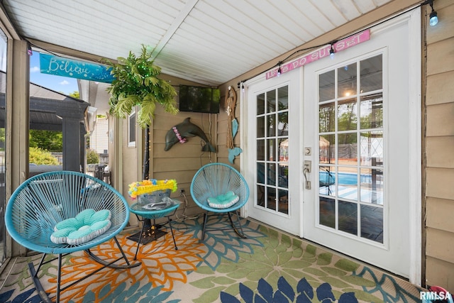 4517 W Hetherwood Dr, Peoria, IL 61615 - sunroom with french doors and healthy amount of natural light