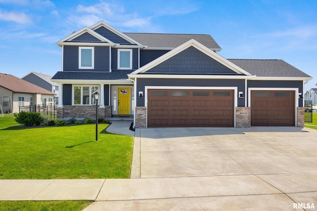 11414 N Joseph St, Dunlap, IL 61525 - craftsman house featuring a garage, brick siding, and concrete driveway