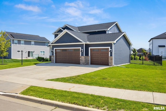 11414 N Joseph St, Dunlap, IL 61525 - view of front facade with concrete driveway and a garage