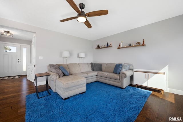 11414 N Joseph St, Dunlap, IL 61525 - living area featuring wood-type flooring, a ceiling fan, and baseboards