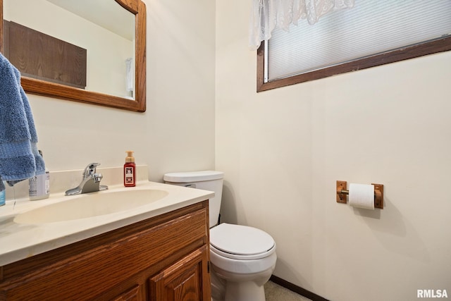 6500 N Allen Rd Unit 62, Peoria, IL 61614 - half bath with toilet, vanity, and baseboards