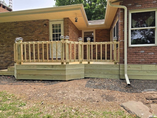 16324 E Cherokee Rd, Cuba, IL 61427 - back of house with brick siding and a deck