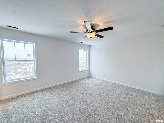 4014 W Fiona Way, Dunlap, IL 61525 - carpeted empty room featuring a ceiling fan and baseboards