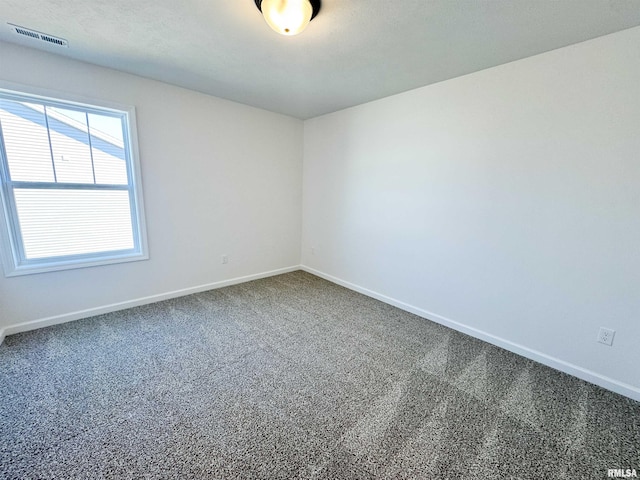 4014 W Fiona Way, Dunlap, IL 61525 - spare room with baseboards and carpet flooring
