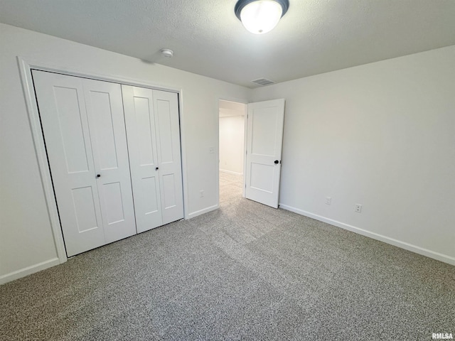 4014 W Fiona Way, Dunlap, IL 61525 - unfurnished bedroom with carpet and a closet