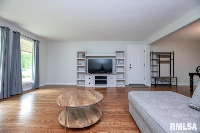 5232 N Merrimac Ave, Peoria, IL 61614 - living room featuring wood finished floors and baseboards