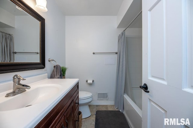 5232 N Merrimac Ave, Peoria, IL 61614 - full bathroom featuring vanity, toilet, shower / bath combination with curtain, tile patterned floors, and baseboards