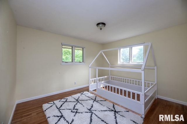 5232 N Merrimac Ave, Peoria, IL 61614 - bedroom with wood finished floors and baseboards
