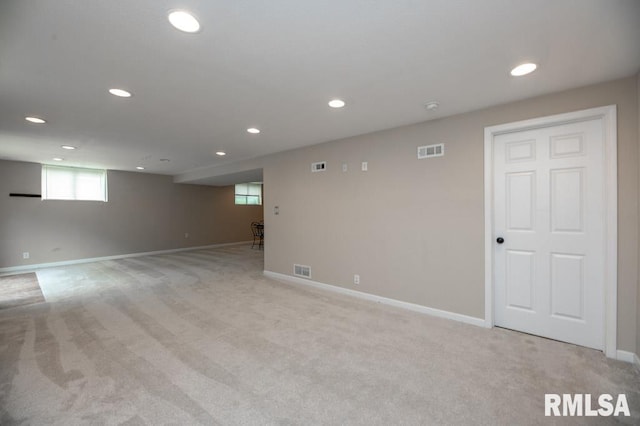 5232 N Merrimac Ave, Peoria, IL 61614 - below grade area featuring light carpet, recessed lighting, and baseboards