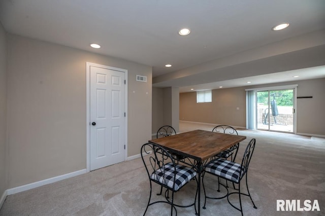 5232 N Merrimac Ave, Peoria, IL 61614 - dining area with light colored carpet, recessed lighting, and baseboards