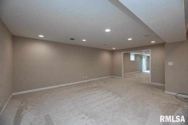5232 N Merrimac Ave, Peoria, IL 61614 - spare room featuring light colored carpet, recessed lighting, and baseboards