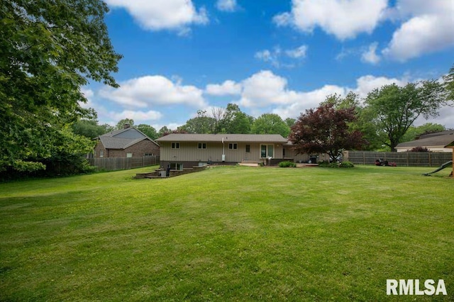 5232 N Merrimac Ave, Peoria, IL 61614 - back of house with a patio area