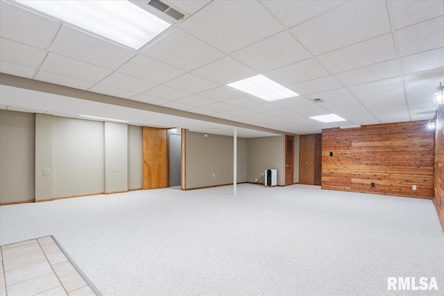 303 W 3rd Ave, Deer Creek, IL 61733 - finished basement with wood walls, carpet flooring, and a drop ceiling