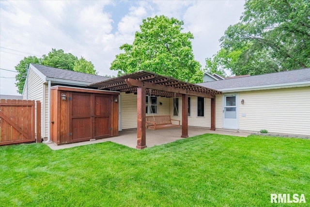 303 W 3rd Ave, Deer Creek, IL 61733 - back of house with a patio, a pergola, a gate, and roof with shingles