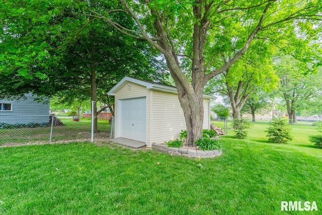 303 W 3rd Ave, Deer Creek, IL 61733 - view of yard featuring a detached garage and an outbuilding