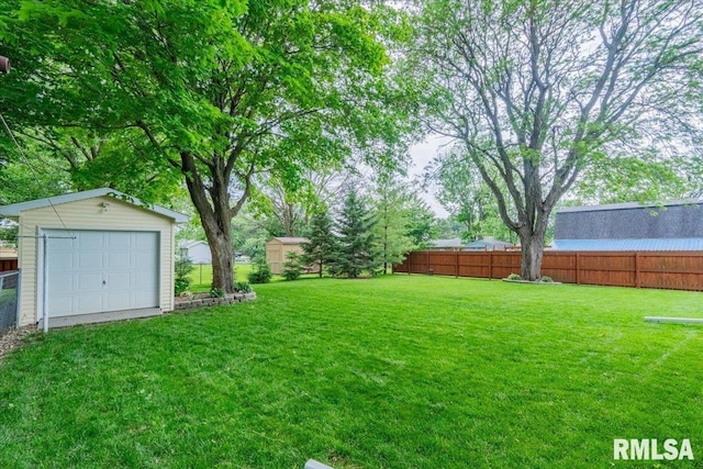 303 W 3rd Ave, Deer Creek, IL 61733 - view of yard with an outbuilding and a detached garage