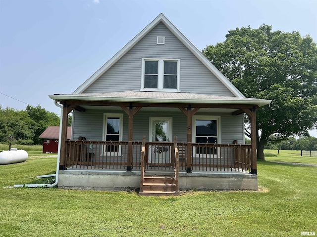 9955 E 750th St, Colchester, IL 62326 - bungalow-style house featuring a porch and a front yard