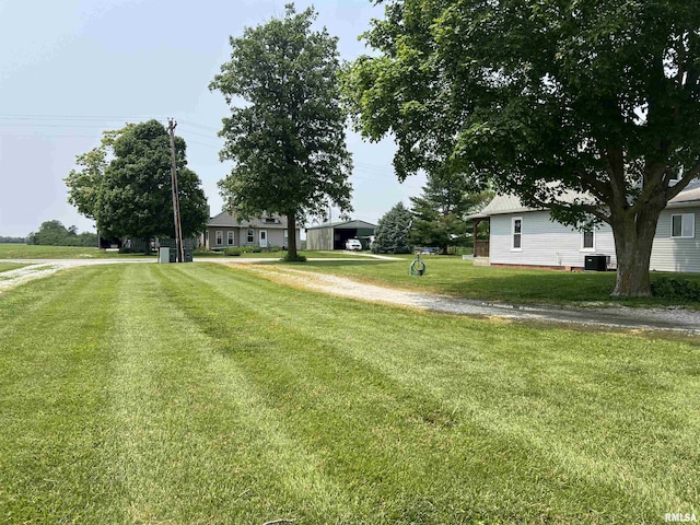 9955 E 750th St, Colchester, IL 62326 - view of green lawn with driveway