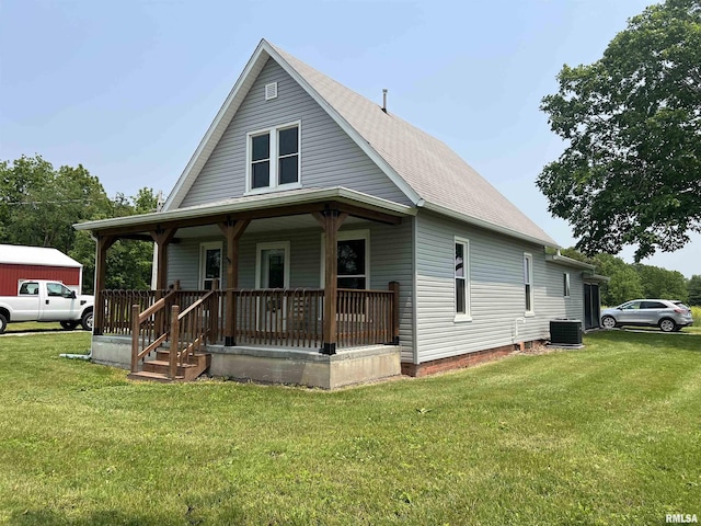 9955 E 750th St, Colchester, IL 62326 - view of front facade featuring a porch, a front yard, and roof with shingles