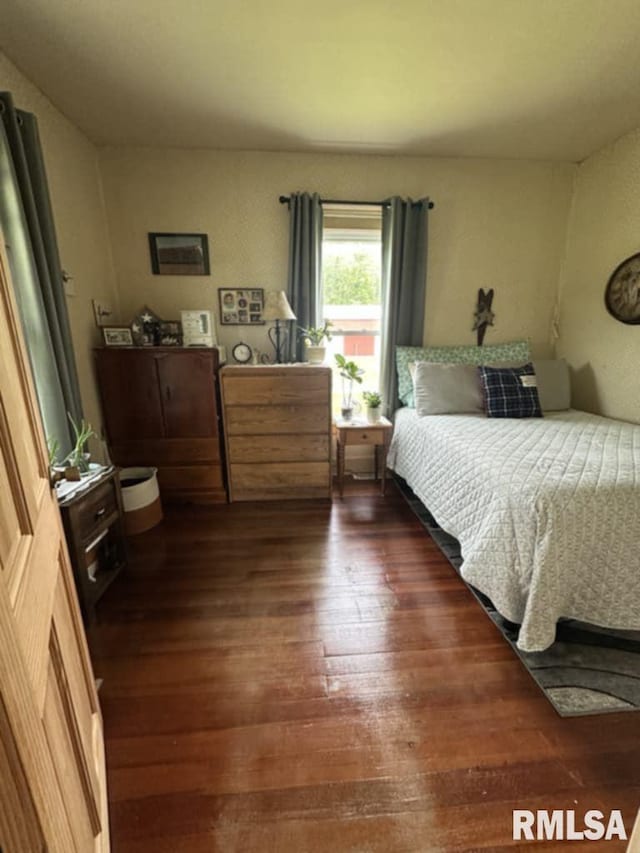 9955 E 750th St, Colchester, IL 62326 - bedroom featuring dark wood-style floors