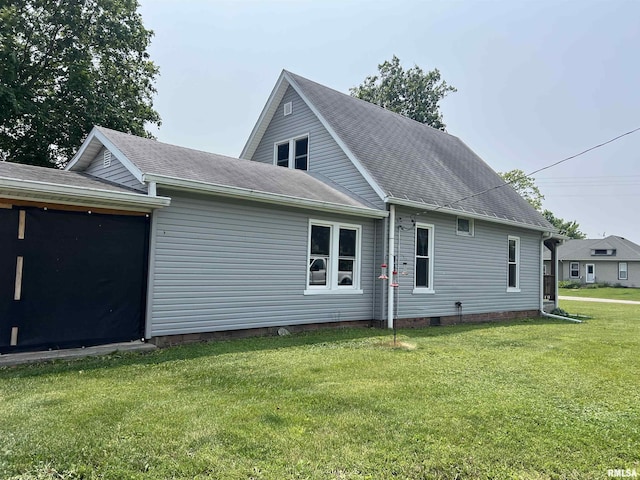 9955 E 750th St, Colchester, IL 62326 - view of property exterior with a lawn and roof with shingles
