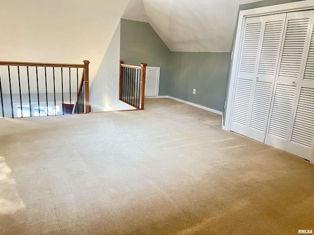 283 Old Germantown Rd, East Peoria, IL 61611 - bonus room featuring carpet, vaulted ceiling, and baseboards