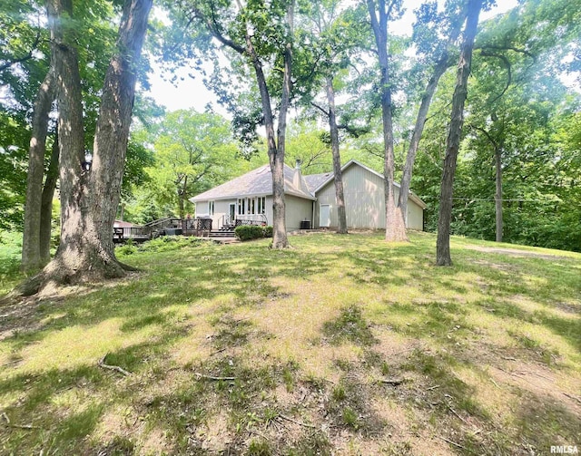 283 Old Germantown Rd, East Peoria, IL 61611 - view of grassy yard featuring a wooden deck