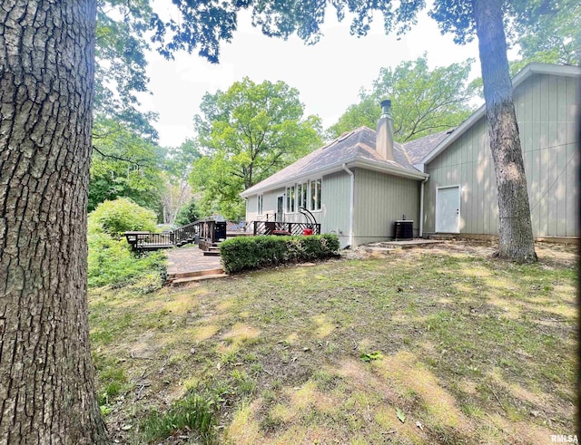 283 Old Germantown Rd, East Peoria, IL 61611 - view of property exterior featuring a deck and a shingled roof