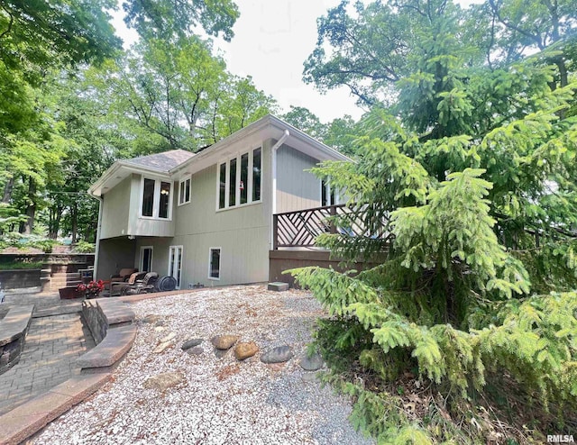 283 Old Germantown Rd, East Peoria, IL 61611 - rear view of property with a patio area and view of scattered trees