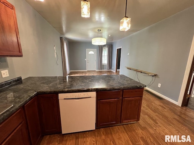 836 S Johnson St, Macomb, IL 61455 - kitchen with wood finished floors, a peninsula, hanging light fixtures, and dishwasher