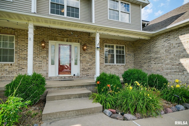 521 S French Dr, Dunlap, IL 61525 - entrance to property with a porch and brick siding