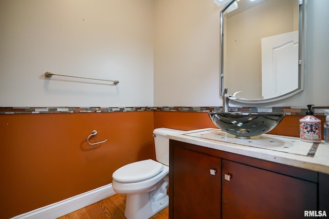 521 S French Dr, Dunlap, IL 61525 - bathroom featuring vanity and wood finished floors