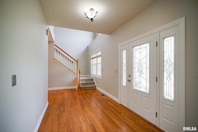 521 S French Dr, Dunlap, IL 61525 - foyer featuring stairs and light wood finished floors