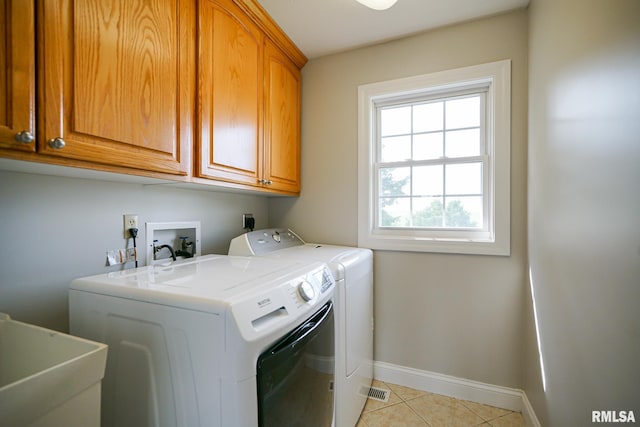 521 S French Dr, Dunlap, IL 61525 - washroom with cabinet space, independent washer and dryer, and light tile patterned floors