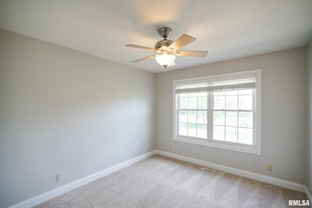 521 S French Dr, Dunlap, IL 61525 - empty room with light colored carpet and ceiling fan