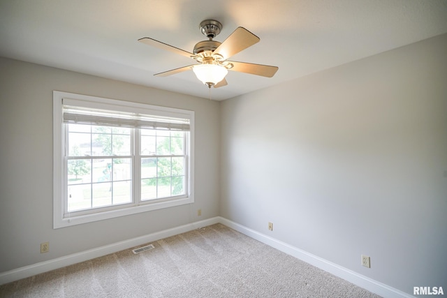 521 S French Dr, Dunlap, IL 61525 - carpeted spare room with baseboards and ceiling fan