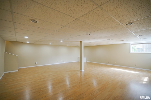 521 S French Dr, Dunlap, IL 61525 - below grade area featuring light wood-type flooring and a drop ceiling
