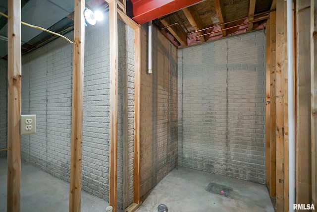 521 S French Dr, Dunlap, IL 61525 - unfinished basement featuring brick wall