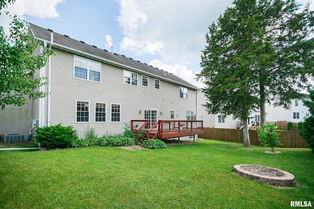 521 S French Dr, Dunlap, IL 61525 - back of property with a wooden deck