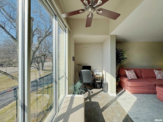 4444 N Knoxville Ave Unit 301, Peoria, IL 61614 - home office with a ceiling fan and stone finish flooring