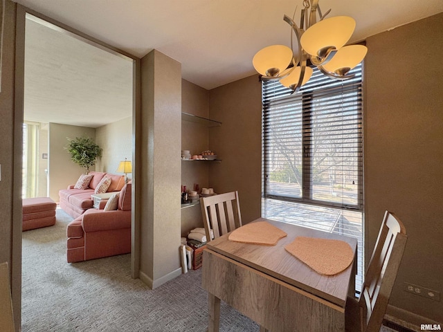 4444 N Knoxville Ave Unit 301, Peoria, IL 61614 - dining space featuring carpet and a chandelier