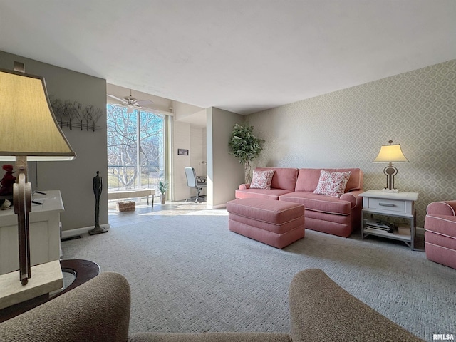 4444 N Knoxville Ave Unit 301, Peoria, IL 61614 - living area with wallpapered walls, ceiling fan, carpet floors, and baseboards